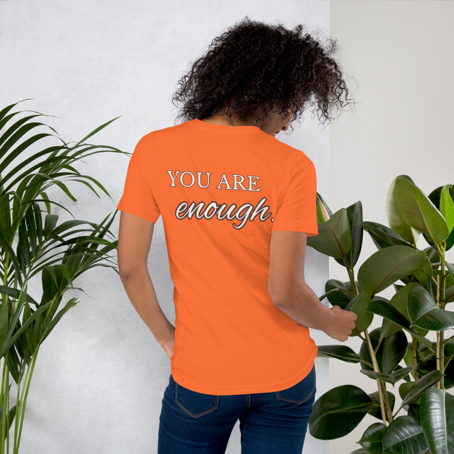 Let everyone know they are enough with this Unisex t-shirt from Kudzu Manor.